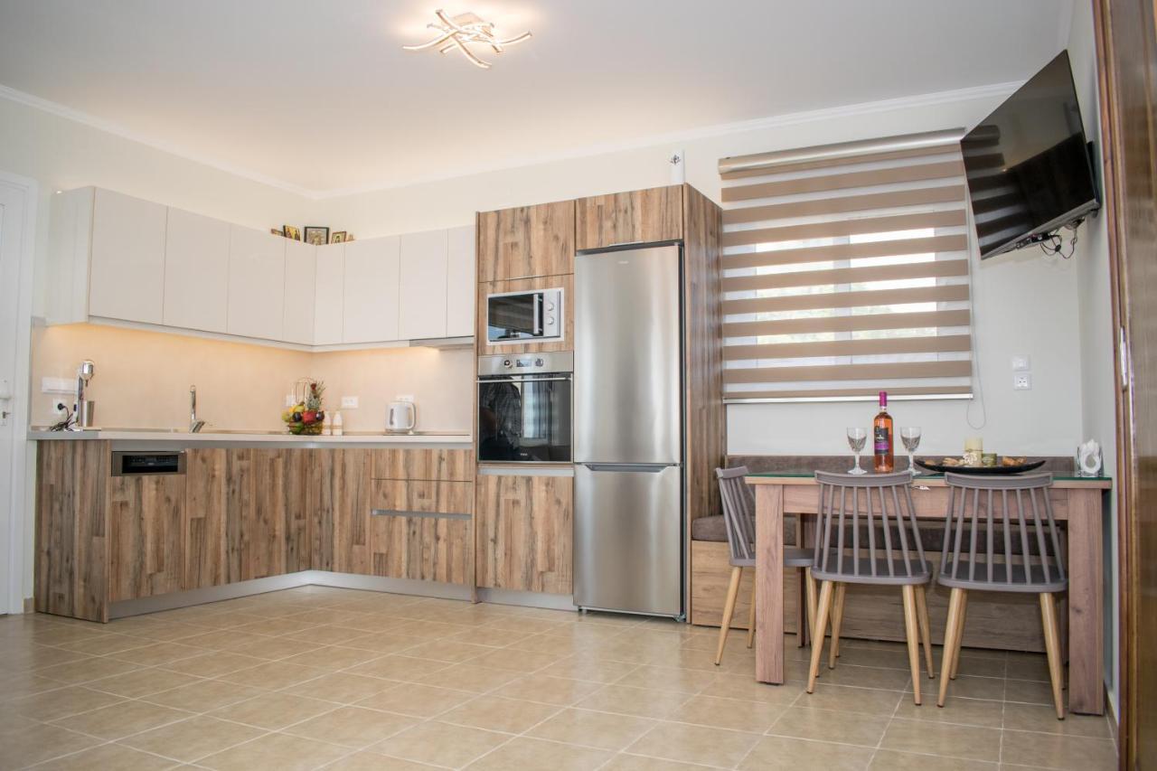 Golden Sunrise Stegna Apartment อาร์คานเยโลส ภายนอก รูปภาพ