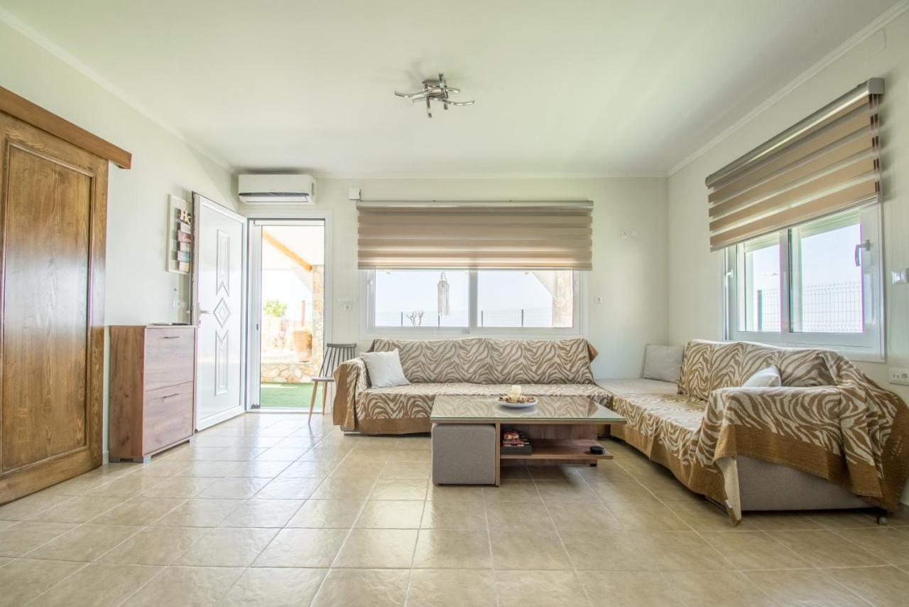 Golden Sunrise Stegna Apartment อาร์คานเยโลส ภายนอก รูปภาพ